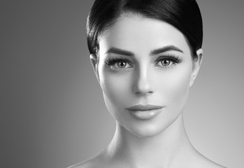 Naklejka premium Monochrome lashes extensions woman eyes macro beauty