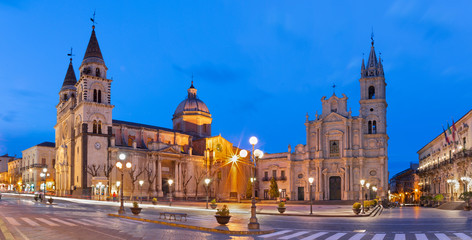 Acireale - The Duomo (Maria Santissima Annunziata) and the church Basilica dei Santi Pietro e Paolo at dusk.