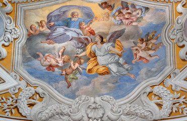 ACIREALE, ITALY - APRIL 11, 2018: The ceiling fresco of Archangel Gabriel (Annunciation) in church Chiesa di San Camillo by Pietro Paolo Vasta (1745 - 1750).
