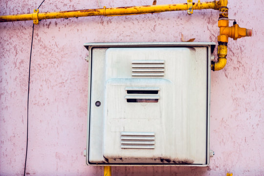 Electric Device System For Public Utility Measurement – Two Door Metal Box Control Panel For Das Flow With A Thick Yellow Pipe On Top