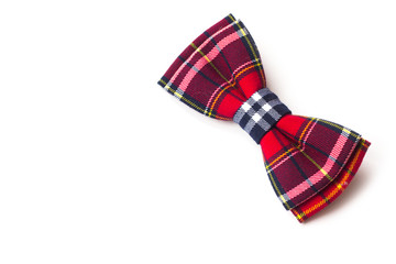 red checkered bow tie on a white background. Men's and women's accessories. Hipster style 