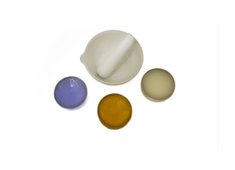 Mortar and ointments isolated in white background