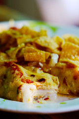 Steamed wrapped rice flour and egg with many kinds of vegetable and chili served with special mix sauce, Thai northern local food with high nutrition and vitamins, good for health concern people
