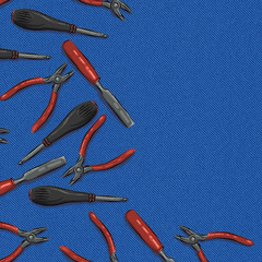 tools on a blue denim background, the chisel, screwdriver, pasatizhi
