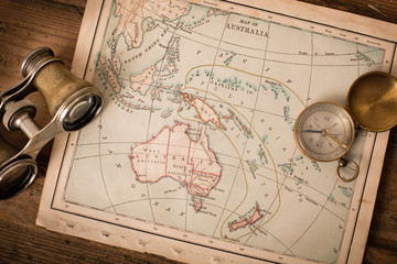 Binoculars and Compass on 1870 Map of Australia – World Travel © IdeaBug, Inc.
