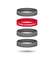 Think differently concept. Be different and individuality. Multicolored rubber wristbands