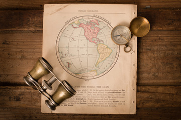 Binoculars and Compass on 1870 Map of Western Hemisphere – World Travel