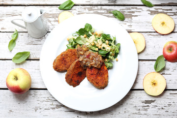 Baked sweet potatoes with chickpea salad. Vegetarian dish.