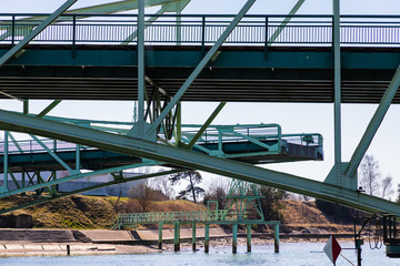 old cutting iron bridge stands in port canal