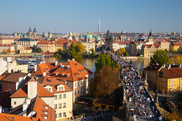 Naklejka na ściany i meble Prague - The of the city with the Charles bridge and the Old Town in evening light..