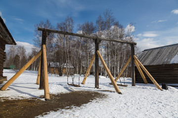 Old russian swing in Irkutsk architectural and ethnographic Museum 