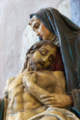 PRAGUE, CZECH REPUBLIC - OCTOBER 14, 2018:  The detail of the statue of Pieta in church of St....