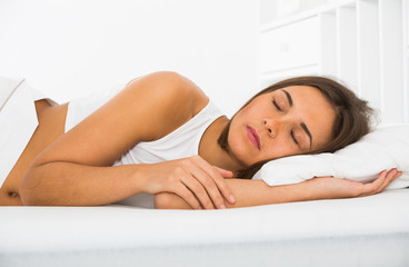 Woman sleeping in bed