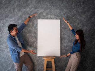 Asian Man and woman with white banner copy space