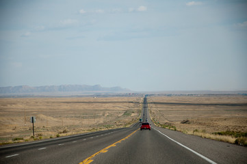 Long straigt road in southwest USA