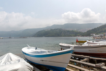 Fototapeta na wymiar Amasra is a small and charming resort on the Black Sea Coast of Turkey. Fishing Boats.