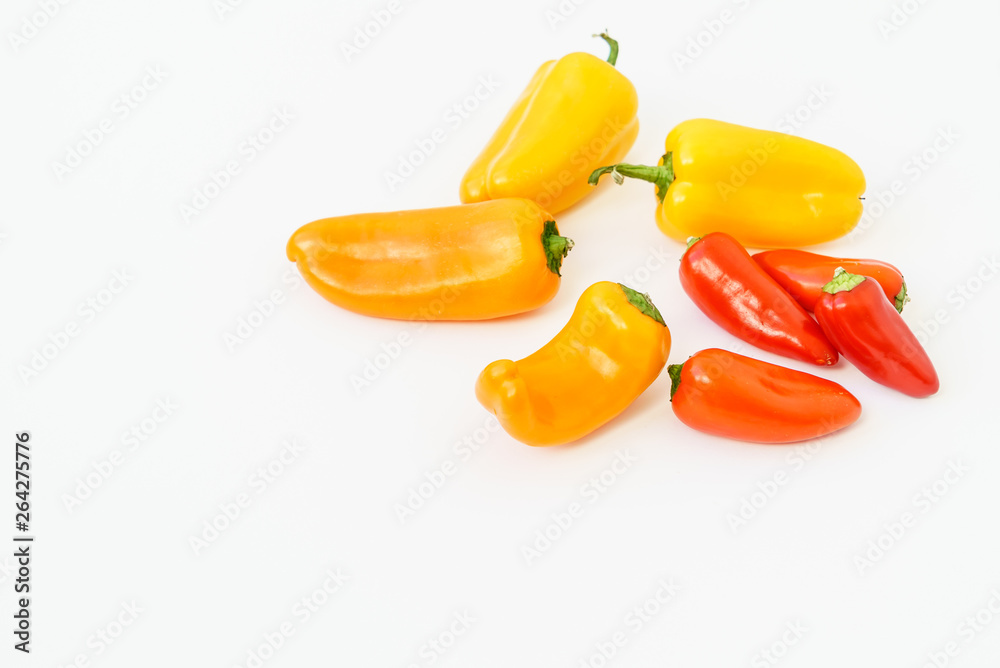 Wall mural sweet peppers on the white background