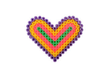 Handmade applique heart shaped  made of tubes isolated on white background