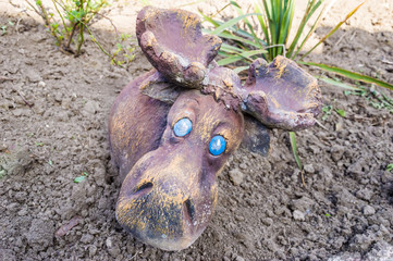 statuette of a deer in the garden