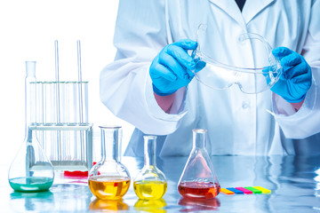 Chemical laboratory. Chemist conducts dialysis of substances. Analytical chemistry. Chemical reactions in solutions. Laboratory test. Scientific research.
