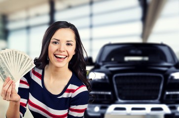 Woman snow currency on car background currency women savings winning people female