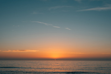 Naklejka na ściany i meble Sunset over the Pacific Ocean in La Jolla, San Diego, California