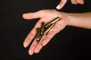Female hand with bullets