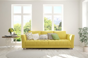 Stylish room in white color with sofa and summer landscape in window. Scandinavian interior design. 3D illustration