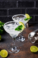 Margarita cocktail with lime and ice