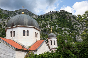 Domes with crosses of Serbian Orthodox Church in Kotor city, Balkans, Montenegro
