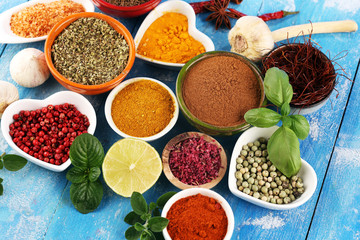 Spices and herbs variation on table. Food and cuisine ingredients.
