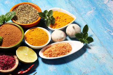 Spices and herbs variation on table. Food and cuisine ingredients.