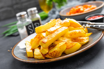 Baked, fried potato on plate