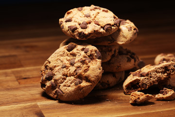 Chocolate cookies on wooden table. Chocolate chip cookies