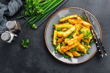 Baked, fried potato on plate