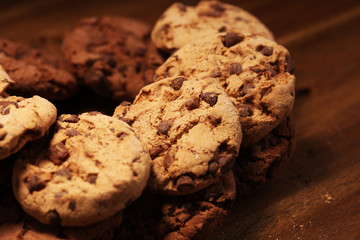 Chocolate cookies on wooden table. Chocolate chip cookies
