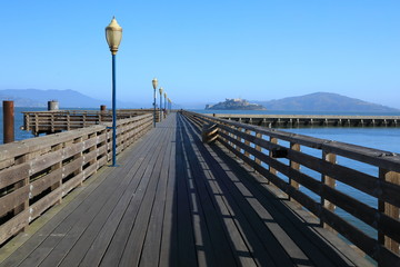 Pier 39 in San Francisco Bay Area with Alcatraz Island in the background