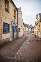Fototapeta na wymiar A picturesque street in the Medieval village of Bayeux France