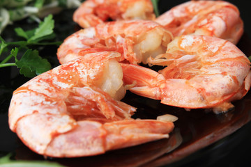 fried shrimp and salad appetizer decorated green vegetables on plate