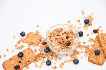 Crunchy muesli cookies and blueberries, Breakfast cereals isolated on white background, selective focus, top view