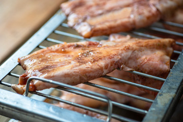 Delicious squid marinated with garlic sauce cooked on BBQ