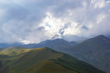 Obraz na płótnie Canvas View of Caucasus mountains near Kazbek peak, Stepantminda, Georgia
