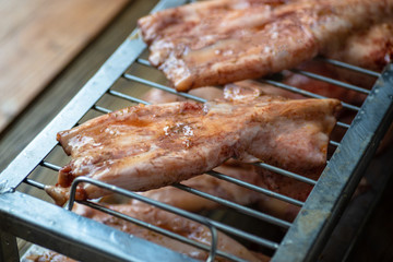 Delicious squid marinated with garlic sauce cooked on BBQ