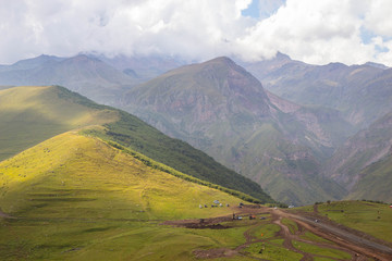 Fototapeta premium View of Caucasus mountains near Kazbek peak, Stepantminda, Georgia