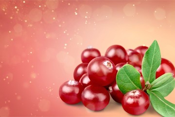 Red cranberries isolated on background