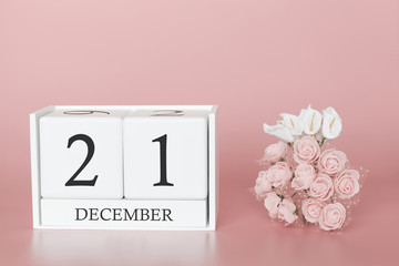 December 21st. Day 21 of month. Calendar cube on modern pink background, concept of bussines and an importent event.