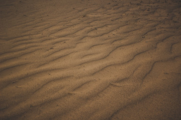 sand waves dramatic dark background