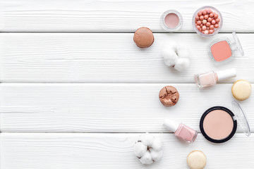 make-up accessories and fashion stylish cosmetics on white wooden desk background top view copy space