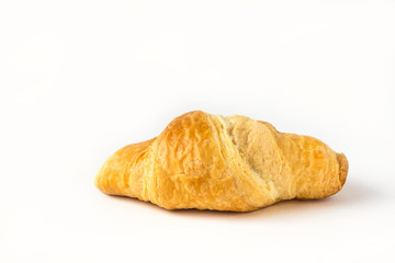 freshly baked croissant isolated on white background