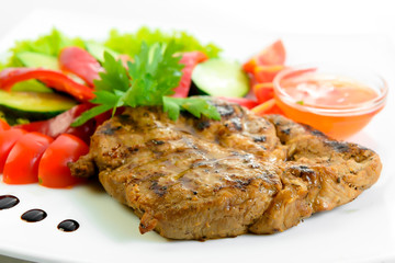 steak meat prepared with fresh vegetables 